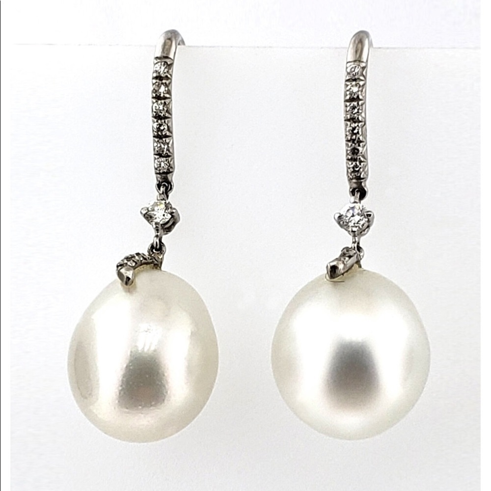 Pearls, Platinum, diamonds earrings.
